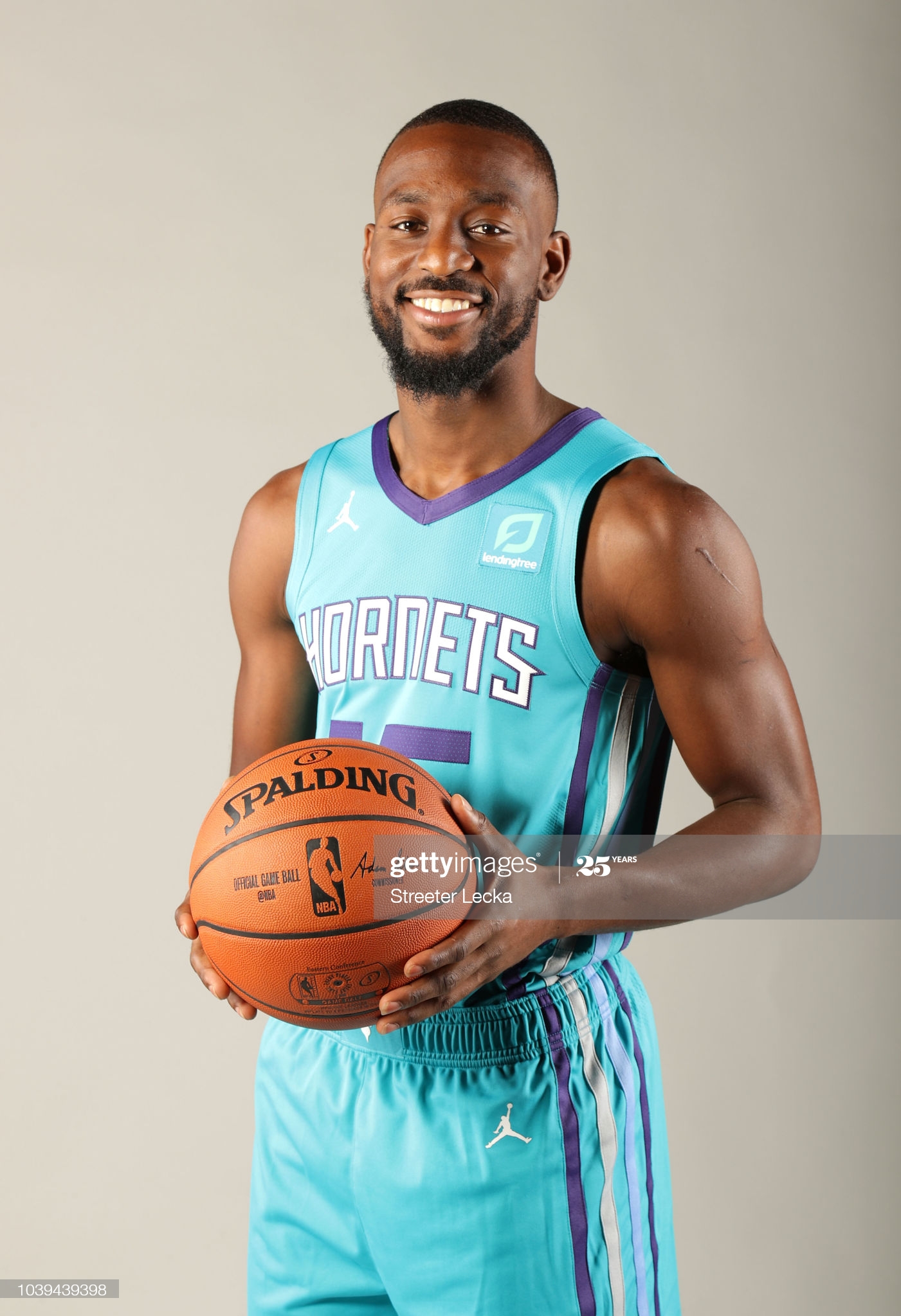kemba-walker-poses-for-a-portrait-during-the-charlotte-hornets-media-picture-id1039439398.jpg