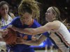Pivec ties up Hodgins for key jump ball (March 23, 2019).jpg