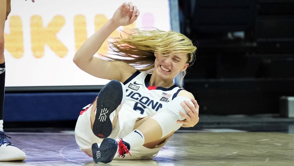 UConn Huskies guard Paige Bueckers holds knee vs Notre Dame Fighting Irish at Harry A. Gampel Pavilion 