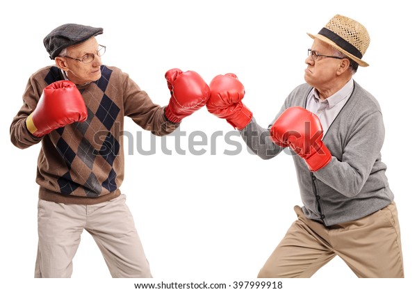 studio-shot-two-competitive-seniors-600w-397999918.jpg