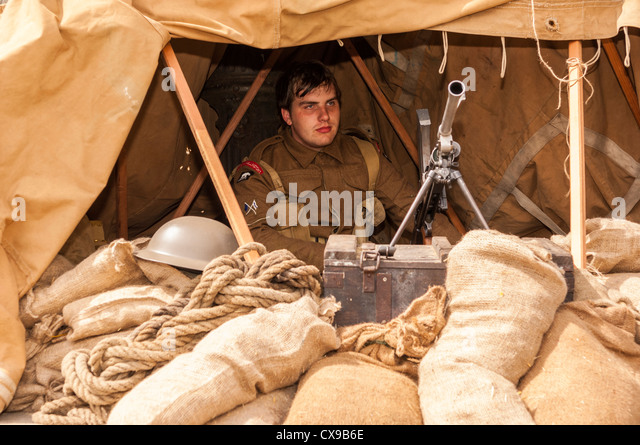 a-man-in-a-bunker-with-gun-at-the-1940s-weekend-at-leyburn-in-north-cx9b6e.jpg