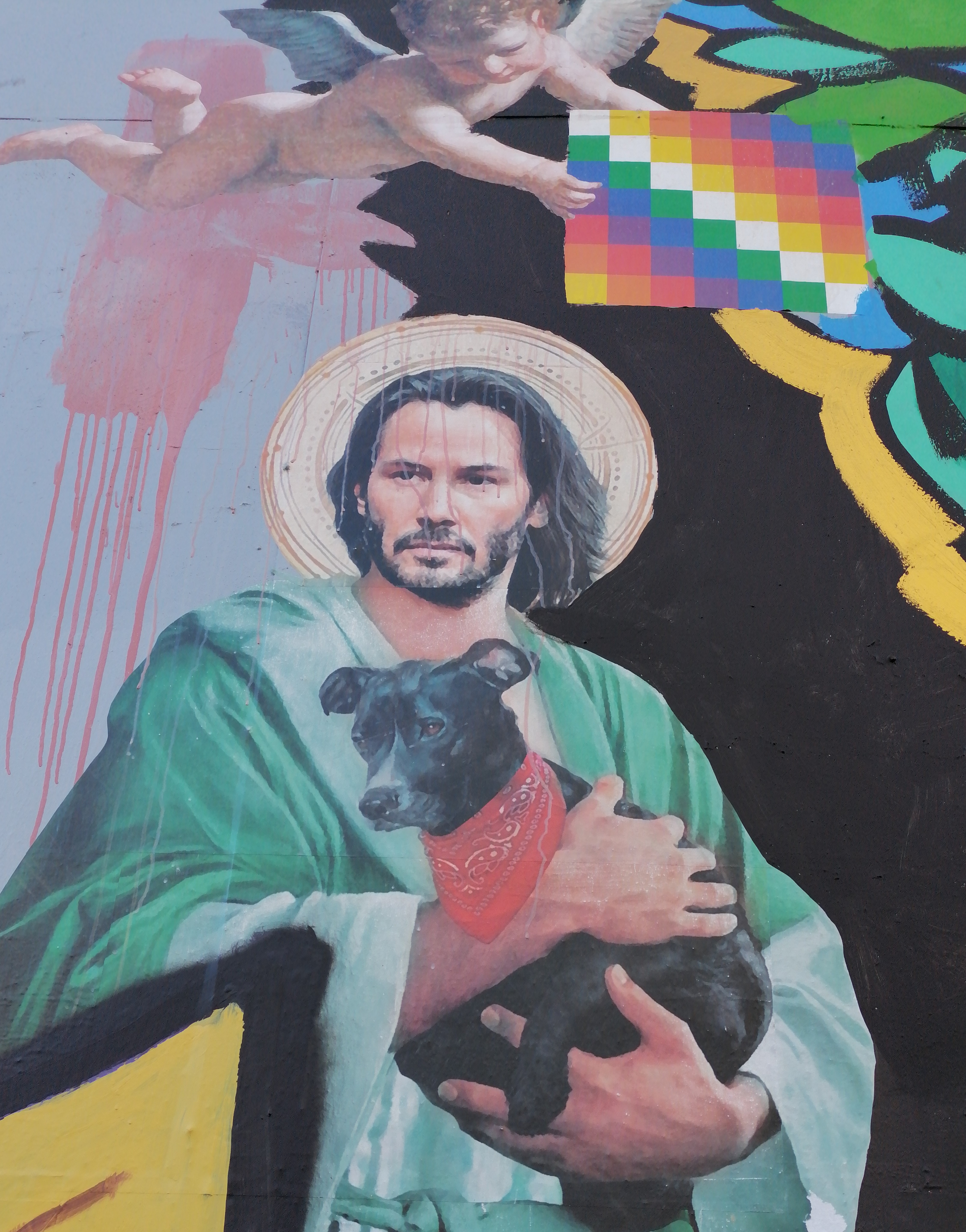 Keanu_Reeves_representado_en_un_mural_en_el_exterior_del_GAM_de_Santiago_de_Chile.jpg